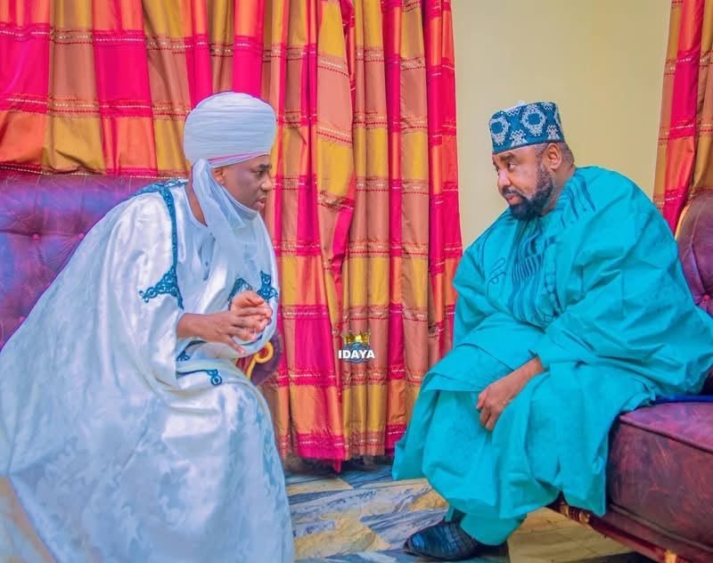 Dr. Jamilu Isyaku Gwamna in consultation with a royal father